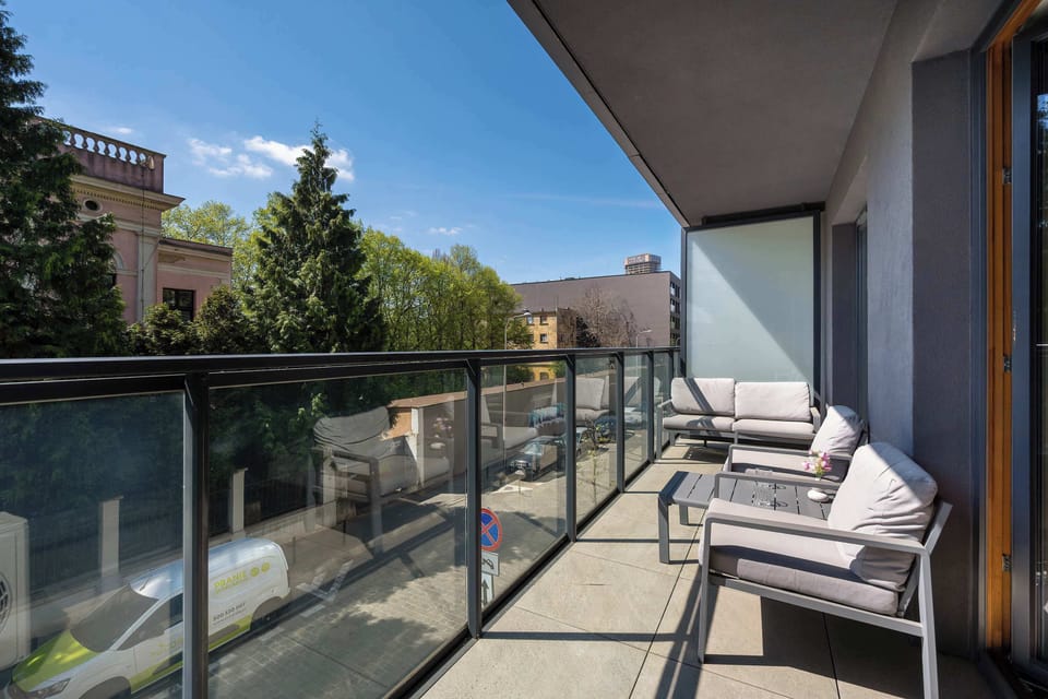The balcony provides a serene environment for relaxation.