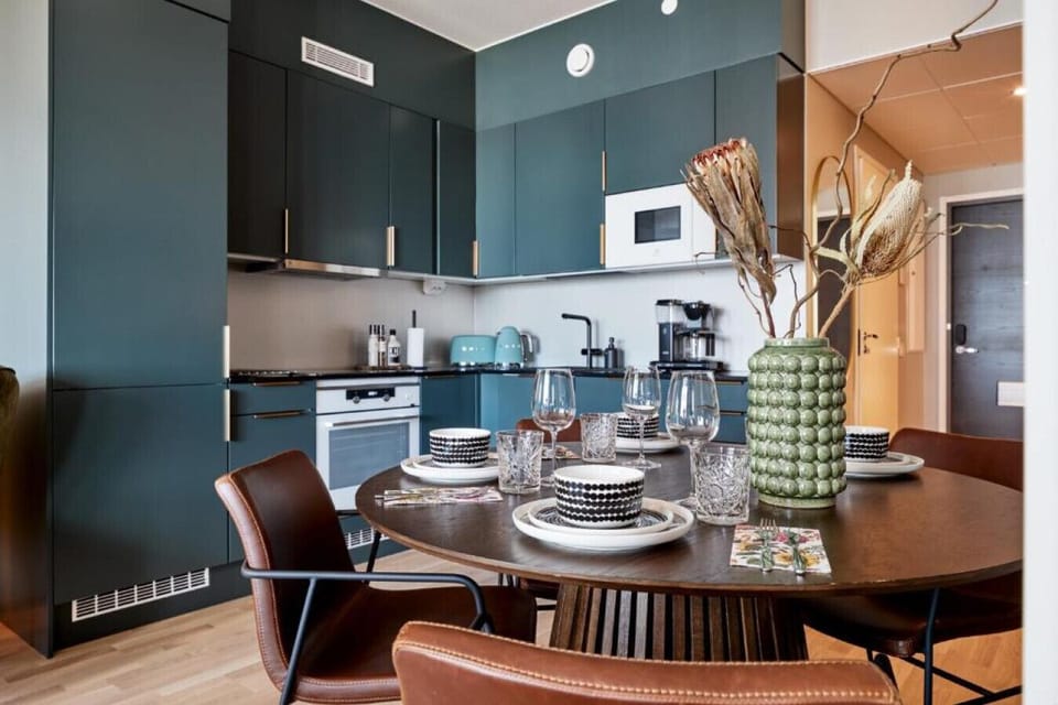 The fully equipped modern kitchen includes everything you need from a dishwasher to a coffee-maker, making it easy to prepare and enjoy meals at home.