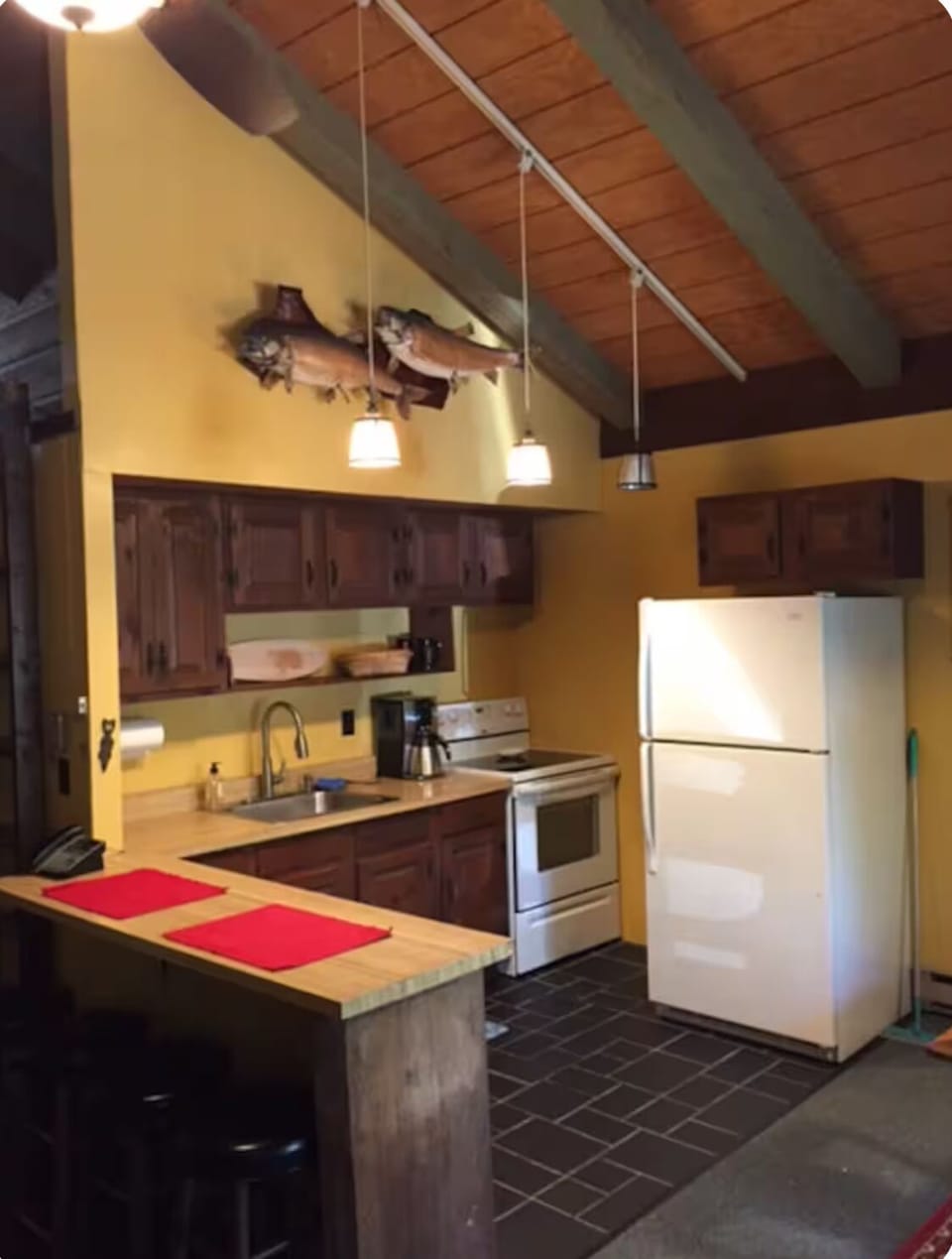 Cozy and fully stocked kitchen.