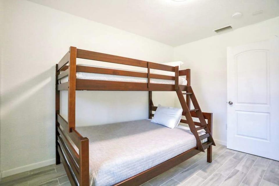 Comfortable guest bedroom offering a cozy and inviting space to relax and recharge after a day of adventure.