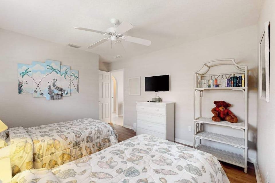 Comfortable guest bedroom offering a cozy and inviting space to relax and recharge after a day of adventure.