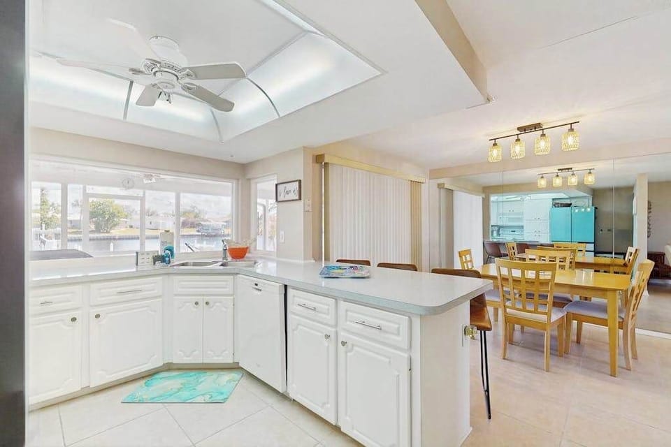 Kitchen includes a starter kit with essentials such as dish soap, detergent, trash bags, toilet paper, and paper towels. Guests are responsible for additional supplies.