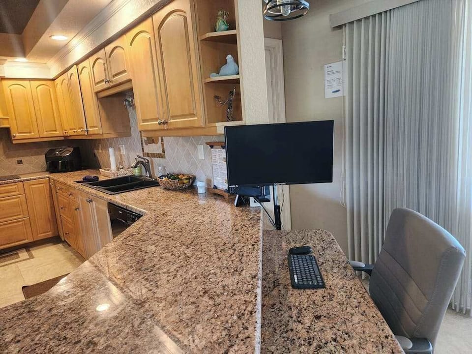 Dedicated work station providing a convenient space for guests to work or catch up on tasks during their stay.