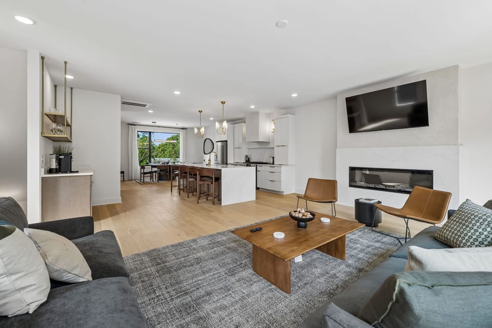 Living Room: Stylish living space featuring a comfy sofa, modern décor, and a flat-screen TV. Ideal for unwinding, socializing, or simply enjoying a peaceful moment indoors.
