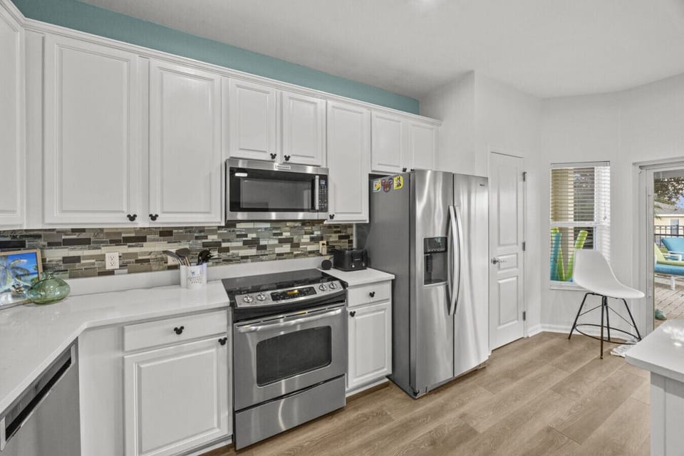 Enjoy a modern kitchen complete with high-end appliances and plenty of prep space.
