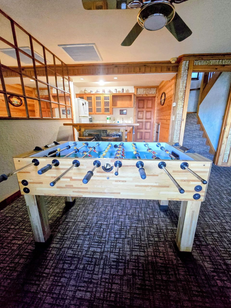 View of the mini bar and foosball table