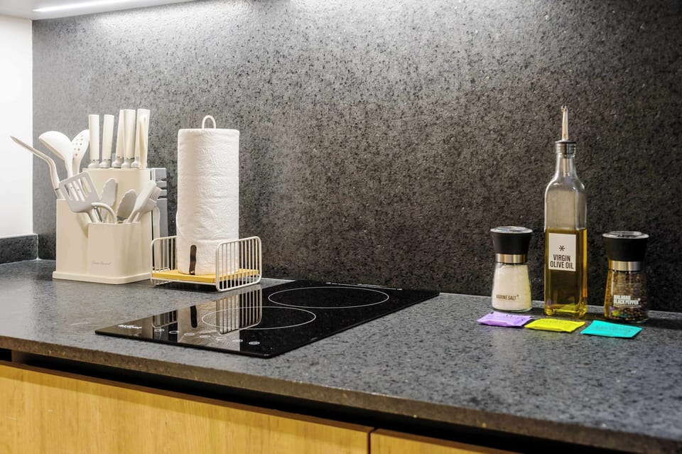 Sleek cooking area with induction cooktop.