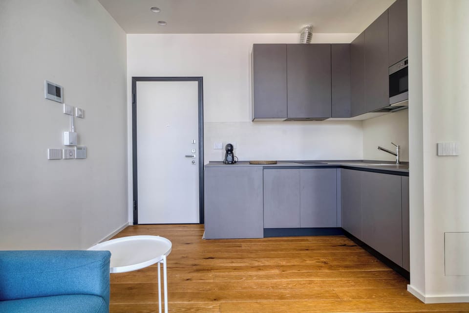 Spacious kitchen area with clean lines and high-quality finishes.
