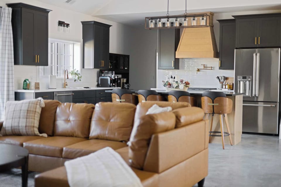 A cozy living and kitchen space made for lingering and sharing meals.