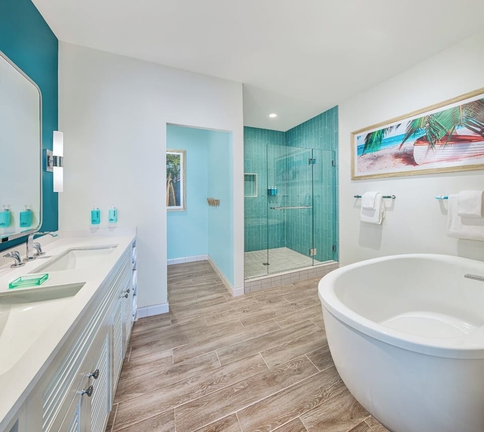 Indulge in a spa-style bath with soaking tub and rain shower.