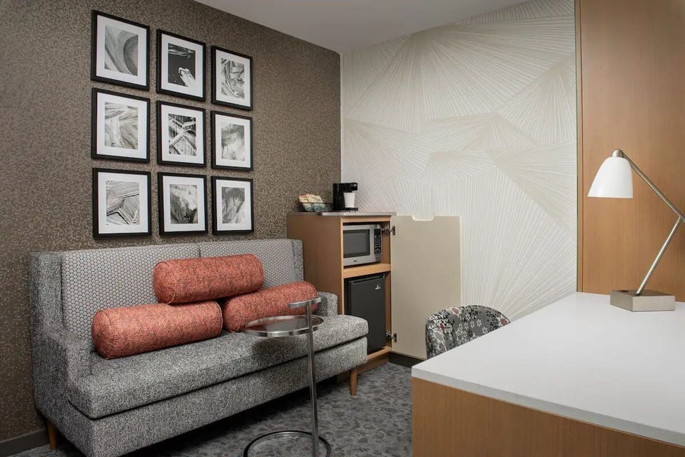 Relax on the cozy sofa with snacks from the kitchenette.