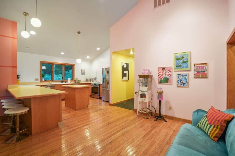 Kitchen: Bright and airy space with modern appliances and colorful decor for fun culinary adventures!
