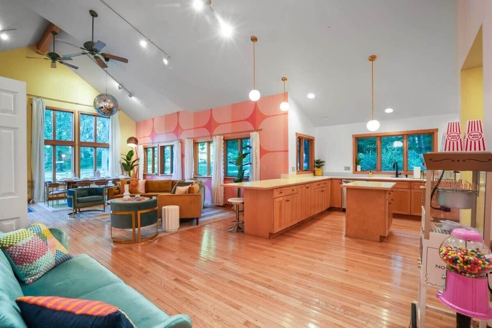 Living Room: Bright and airy space with vibrant decor, perfect for gathering and relaxation!