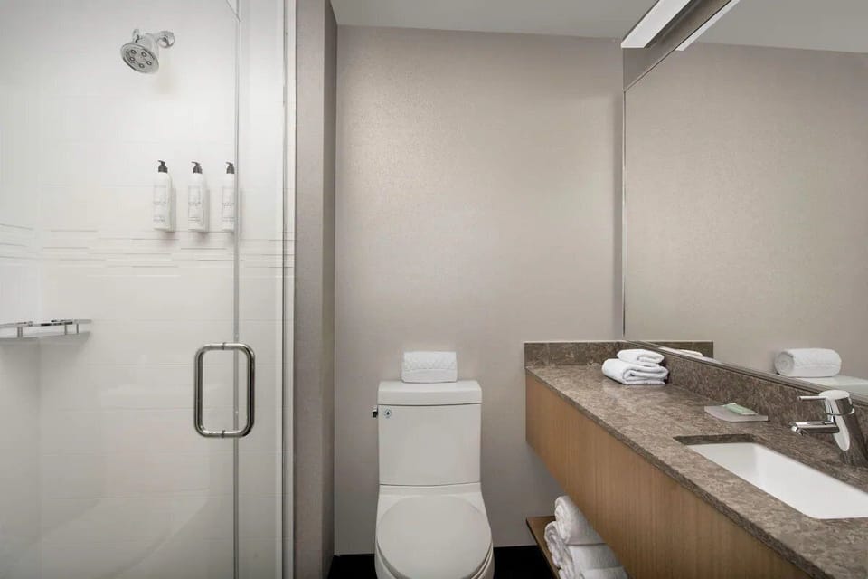 Start your day with an invigorating shower in a spotless bath.