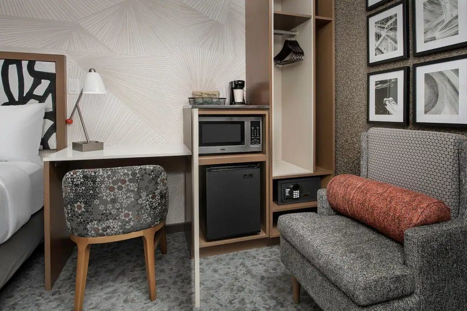 Get productive at the cozy desk with handy in-room essentials.