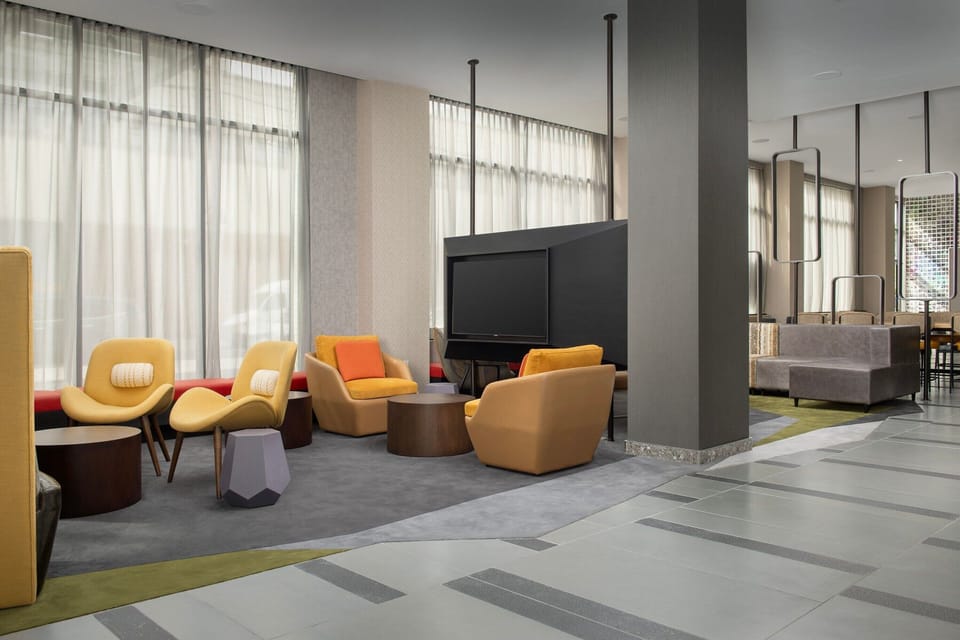 Relax in sunlit lounge seating designed for effortless comfort.