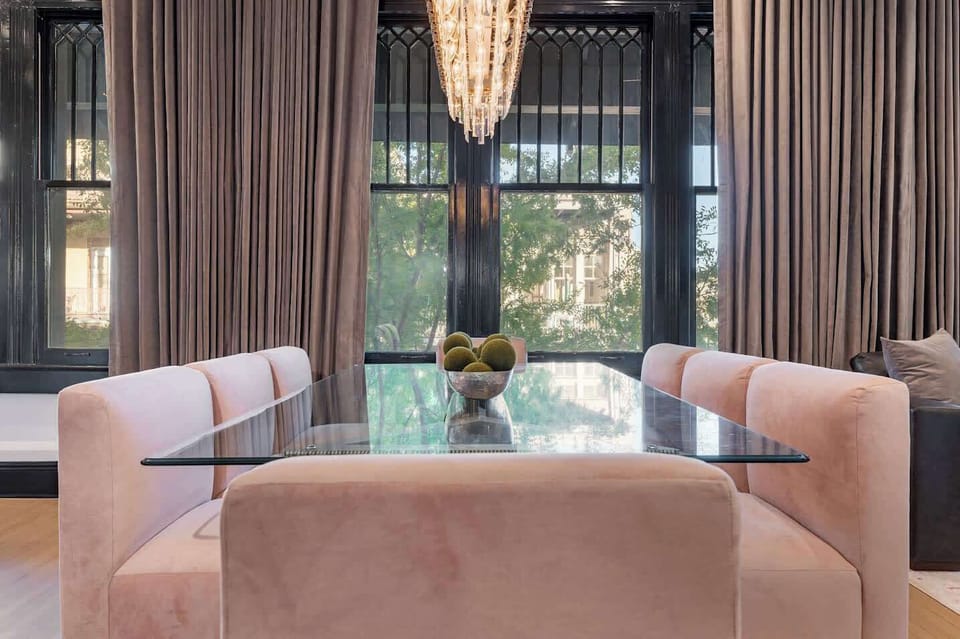 Living / Dining Area. Table dining for eight, counter dining for four, and queen-size sleeper sofa.