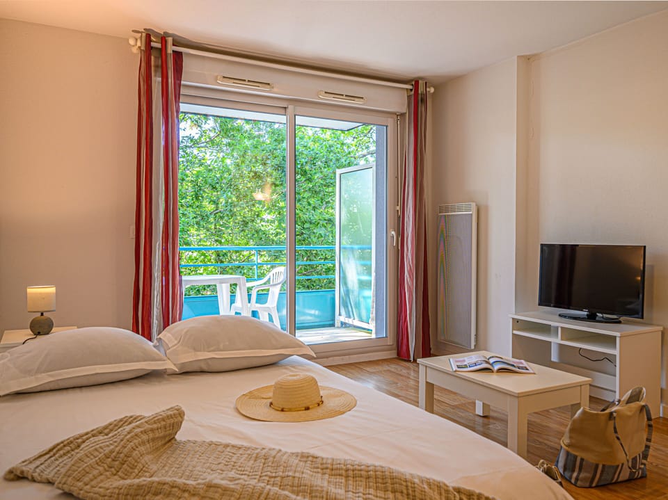 Settle into the double sofa bed with crisp linens and the TV nearby for a quiet evening in