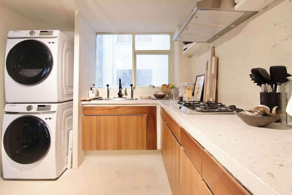 Experience the delight of culinary creations in our fully equipped kitchen, complete with essential supplies like coffee, oil, salt, pepper, and tea. Unleash your inner chef and savor every moment of preparing delicious meals with ease. 