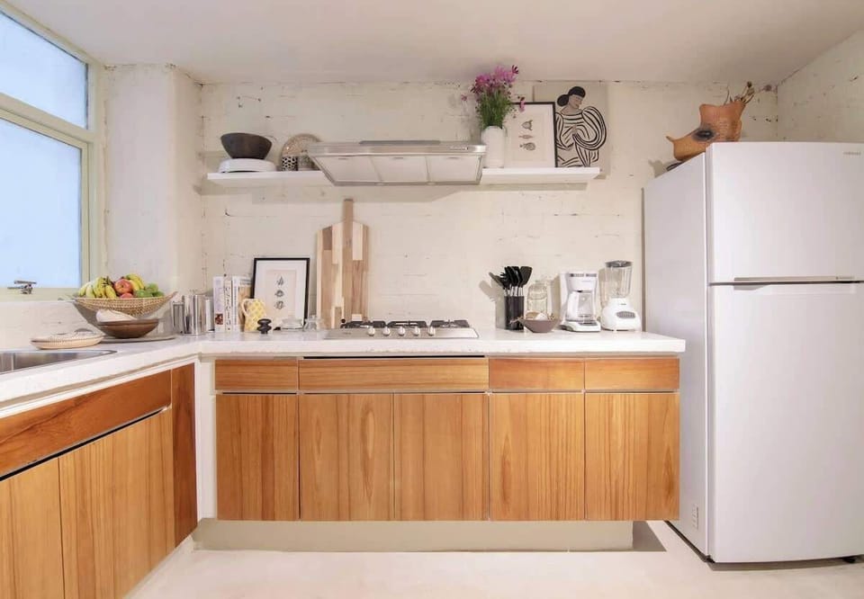 Experience the delight of culinary creations in our fully equipped kitchen, complete with essential supplies like coffee, oil, salt, pepper, and tea. Unleash your inner chef and savor every moment of preparing delicious meals with ease. 