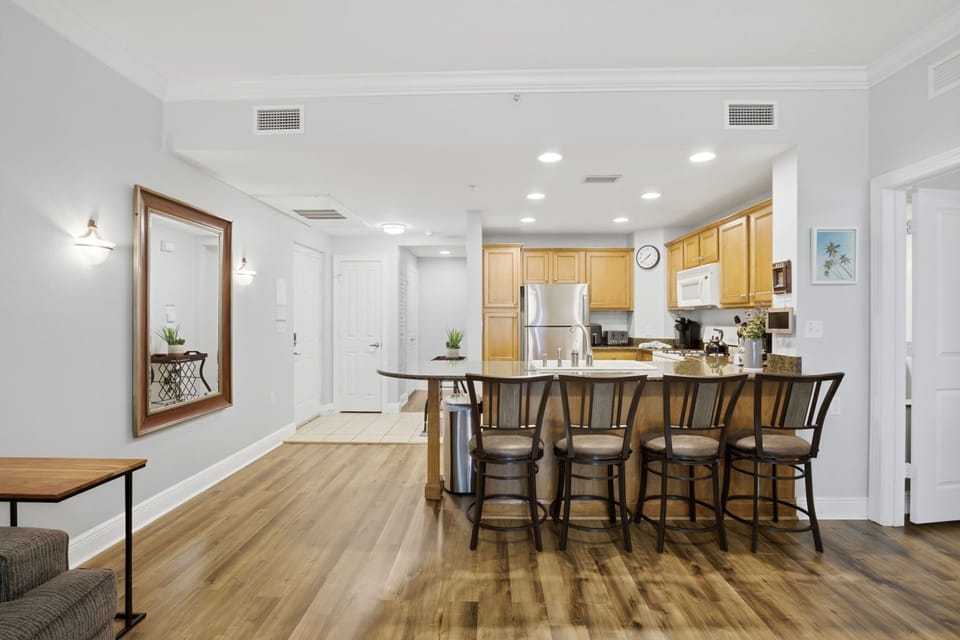 Fully equipped kitchen with bar seating for casual meals