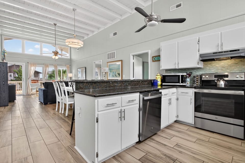 Easy flow from kitchen to dining makes hosting a breeze