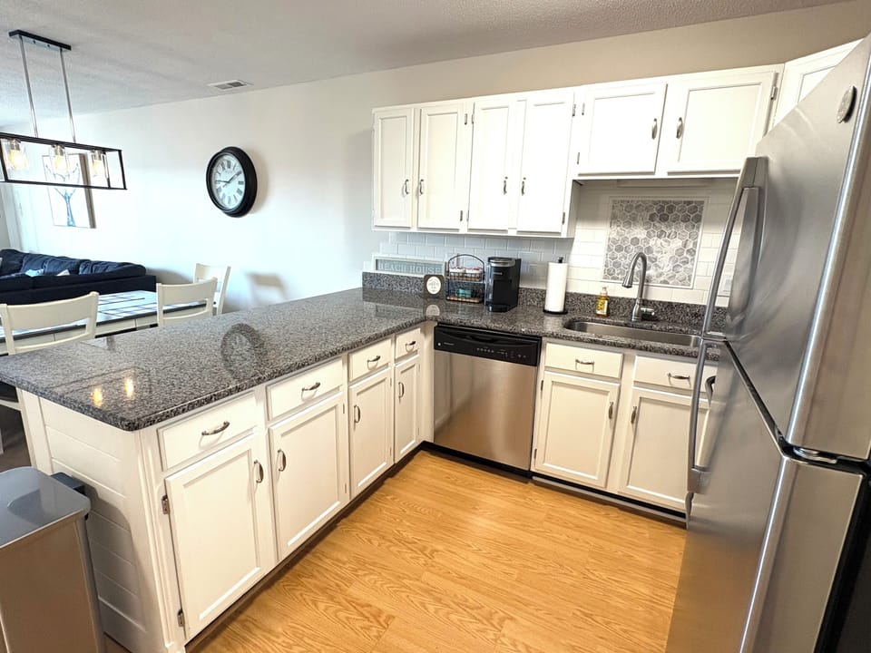Kitchen is well appointed with all supplies.