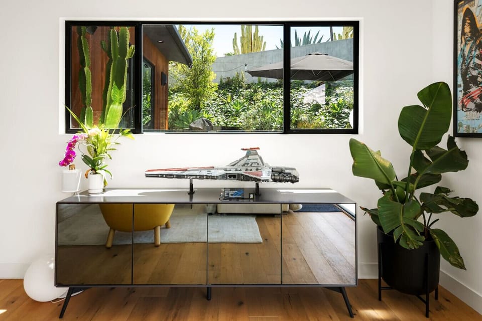 A beautifully appointed workspace with garden views and plenty of natural light — ideal for those who need to stay productive without sacrificing style or comfort