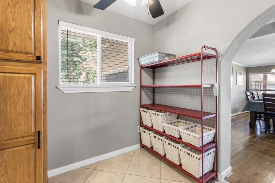 Mudroom | Red Metal Shelving | Wicker Storage Baskets & Ceiling Fan