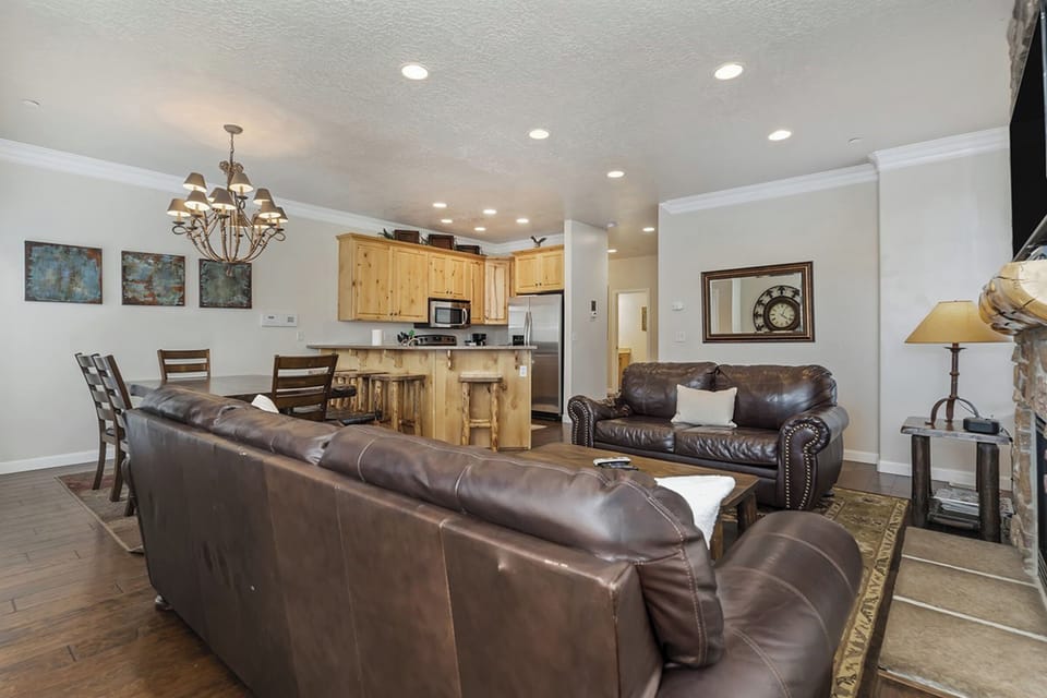 An open-concept living area seamlessly connects kitchen, dining, and lounge spaces—ideal for entertaining and effortless group living.