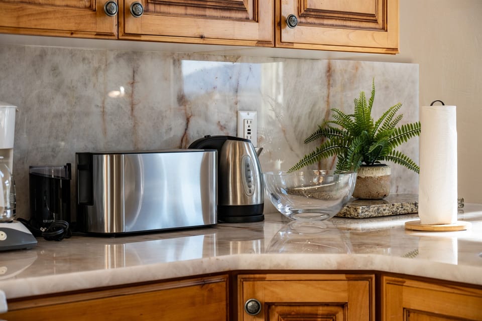 Convenient kitchen essentials and coffee station ready for relaxing mornings at the lake.