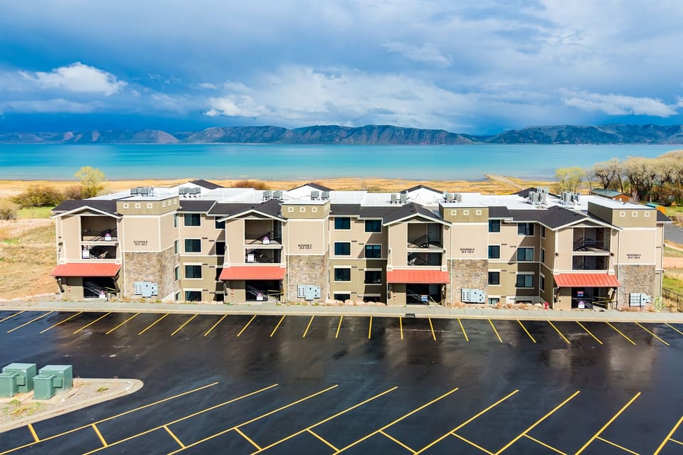 Aerial views showcase the stunning turquoise waters and the surrounding landscape.