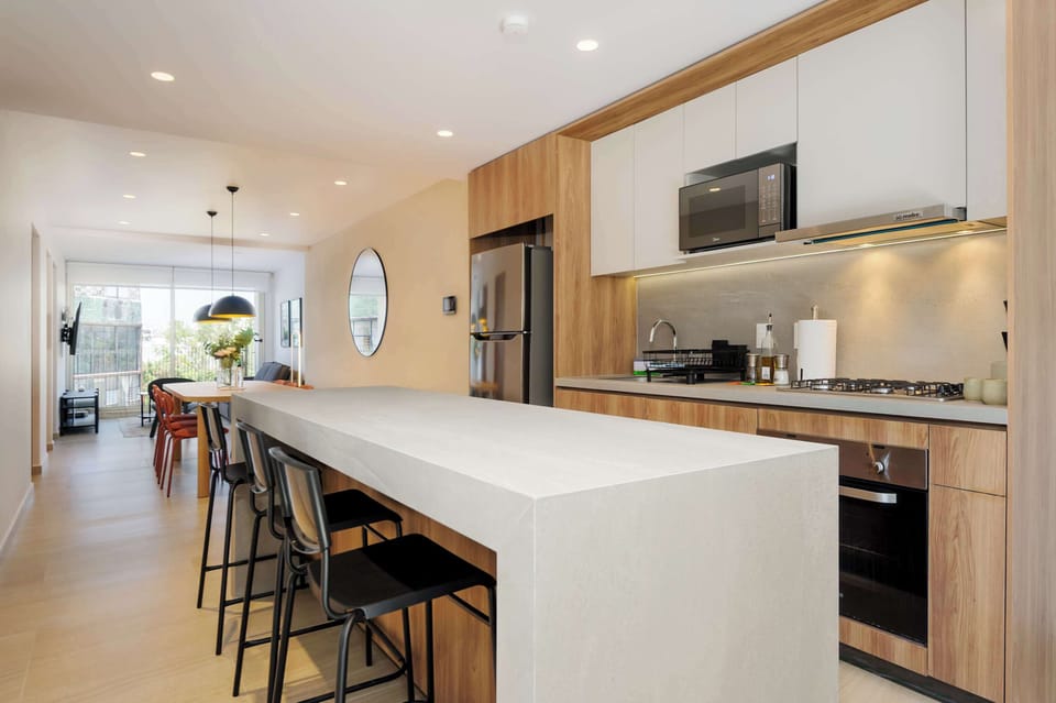 Open kitchen seamlessly connected to living space
