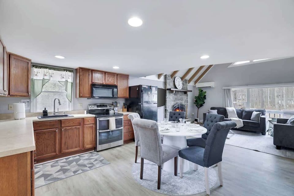 Spacious open-concept living, dining, and kitchen area designed for you to relax, gather, and feel at home.