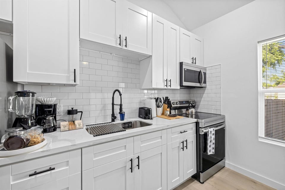 Cook, bake, or brew your favorite drinks in a fully stocked kitchen with coffee, sugar, cream, and tea provided.