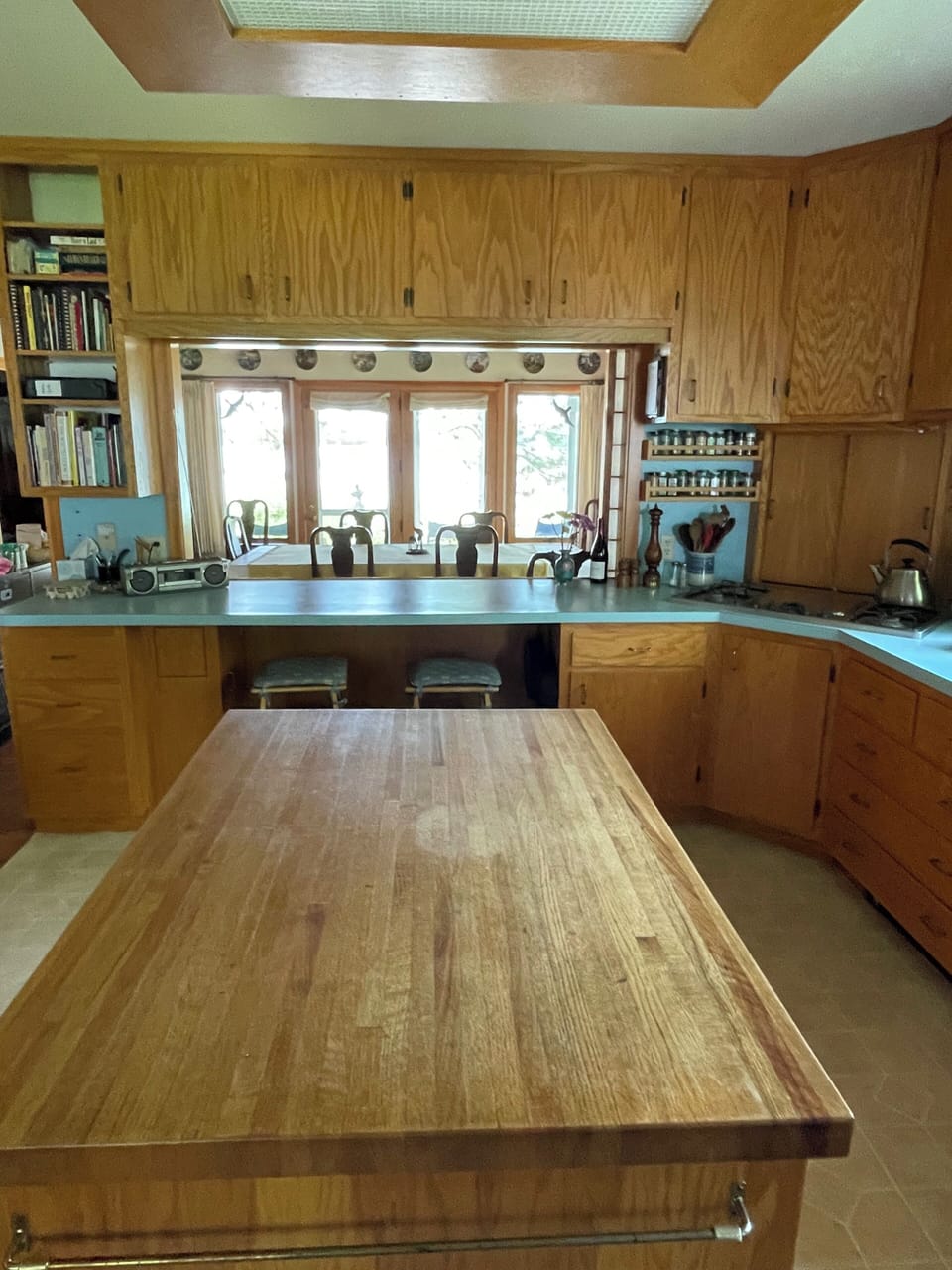 Kitchen view to Dining Room and Lake beyond