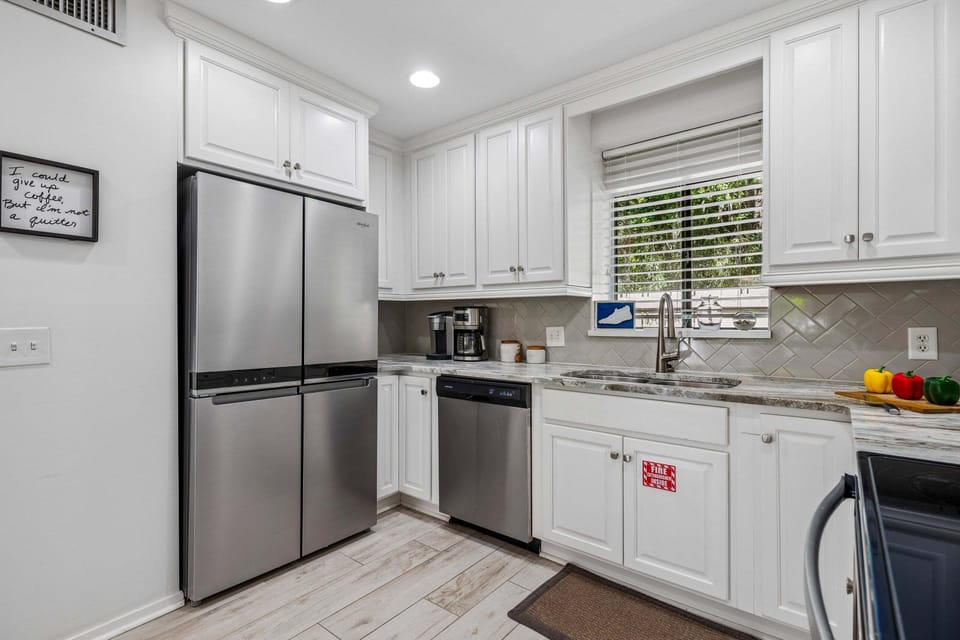 Stainless steel appliances throughout the kitchen