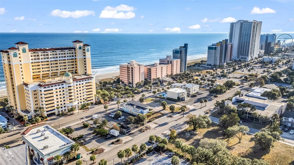 Beachfront resort just steps from the ocean! Access to on-site parking garage included! Convenient ten minute walk along the beach or boulevard to the world famous Myrtle Beach SkyWheel & Boardwalk! Plenty of restaurants and shopping for everyone to enjoy!
