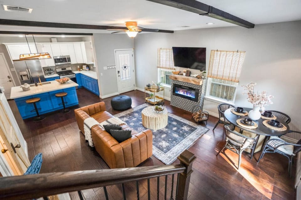 Modern comfort meets stylish design. Relax on the designer leather sofa or enjoy a movie night with a 65-inch HD TV!