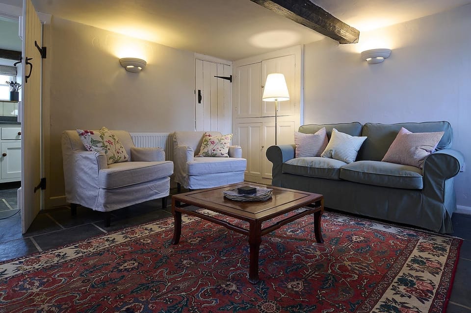 Cosy Sitting Room with log burning stove