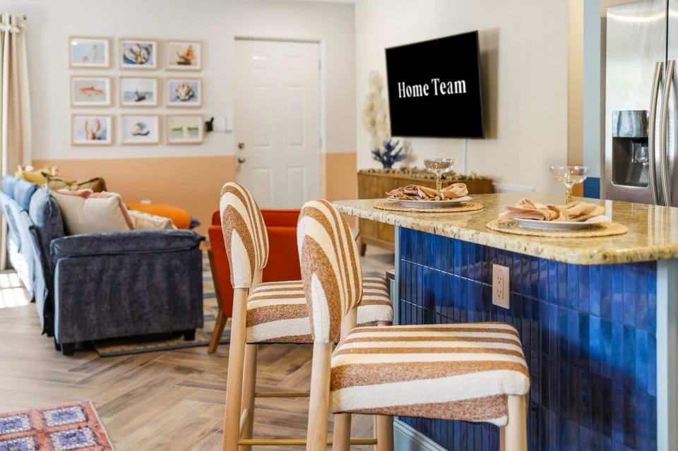 Eat, Lounge & Feel Right at Home – From casual breakfast at the kitchen island to game day on the big screen, this charming and connected living space makes every moment of your stay feel effortlessly comfortable and wonderfully familiar.
