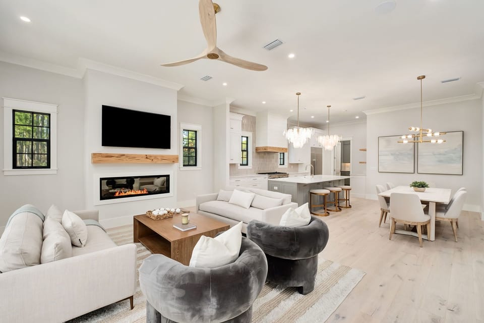 Unwind in your elegant open-plan retreat where modern comfort meets sophisticated design, complete with cozy fireplace and gourmet kitchen.