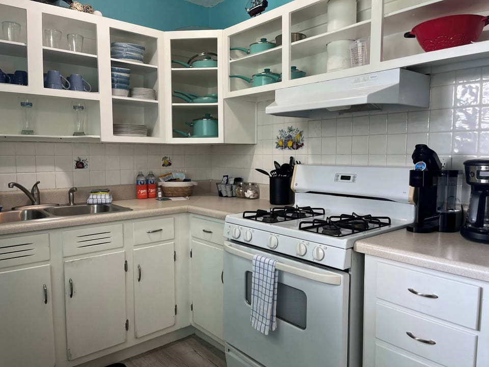 Kitchen w/ gas stove (note: no microwave or dishwasher)