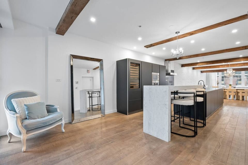 Sophisticated design meets modern luxury. This stunning open-concept space features a chef’s kitchen, elegant finishes, and timeless architectural details throughout.