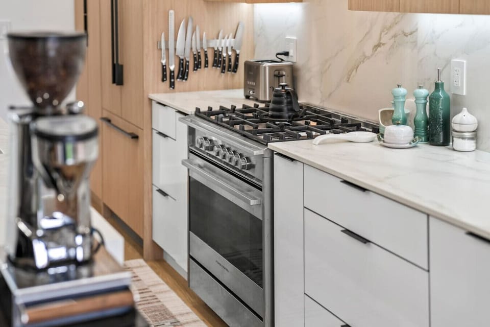 Gourmet Kitchen: Experience culinary adventures with top-notch appliances and elegant finishes!
