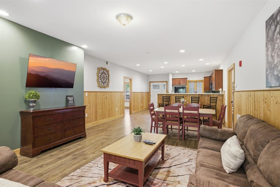 The living room in Unit 711 brings everyone together with an easy, comfortable layout that makes it simple to relax, connect, and enjoy the moment.