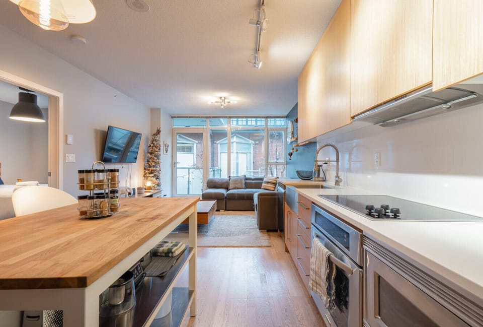 Modern Kitchen: Sleek countertops and bright lighting set the stage for culinary adventures!