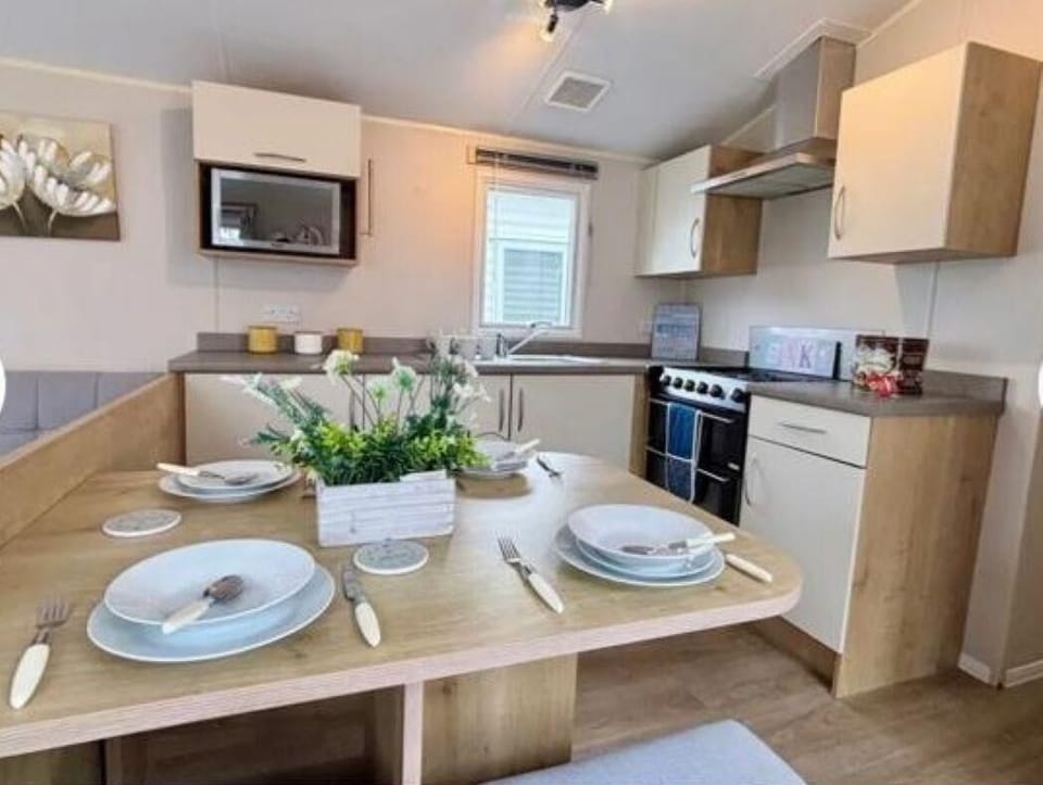 The dining table seats four comfortably. Serve up a freshly cooked dinner for the whole family. After dinner grab the board games and have a fun filled family night in. You will love making memories with everyone.