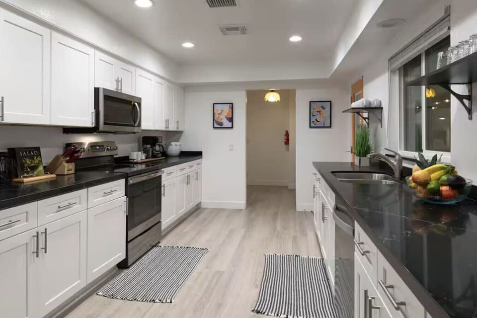 Fully equipped kitchen with GE appliances and everything needed for group meals