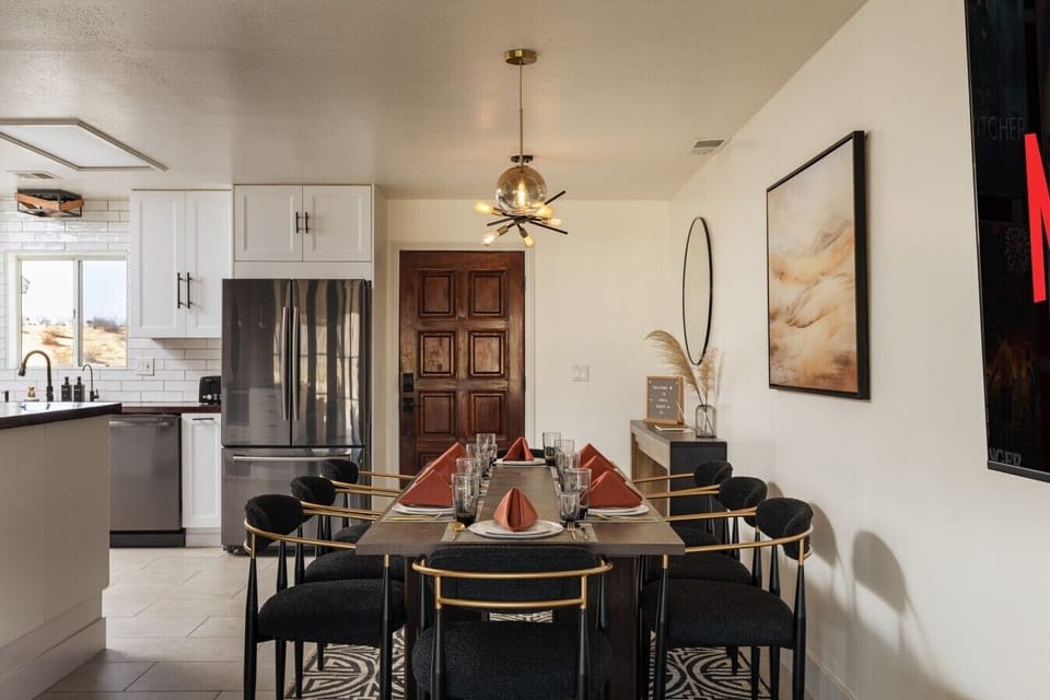Enjoy easy meals at the dining table with the kitchen just steps away.